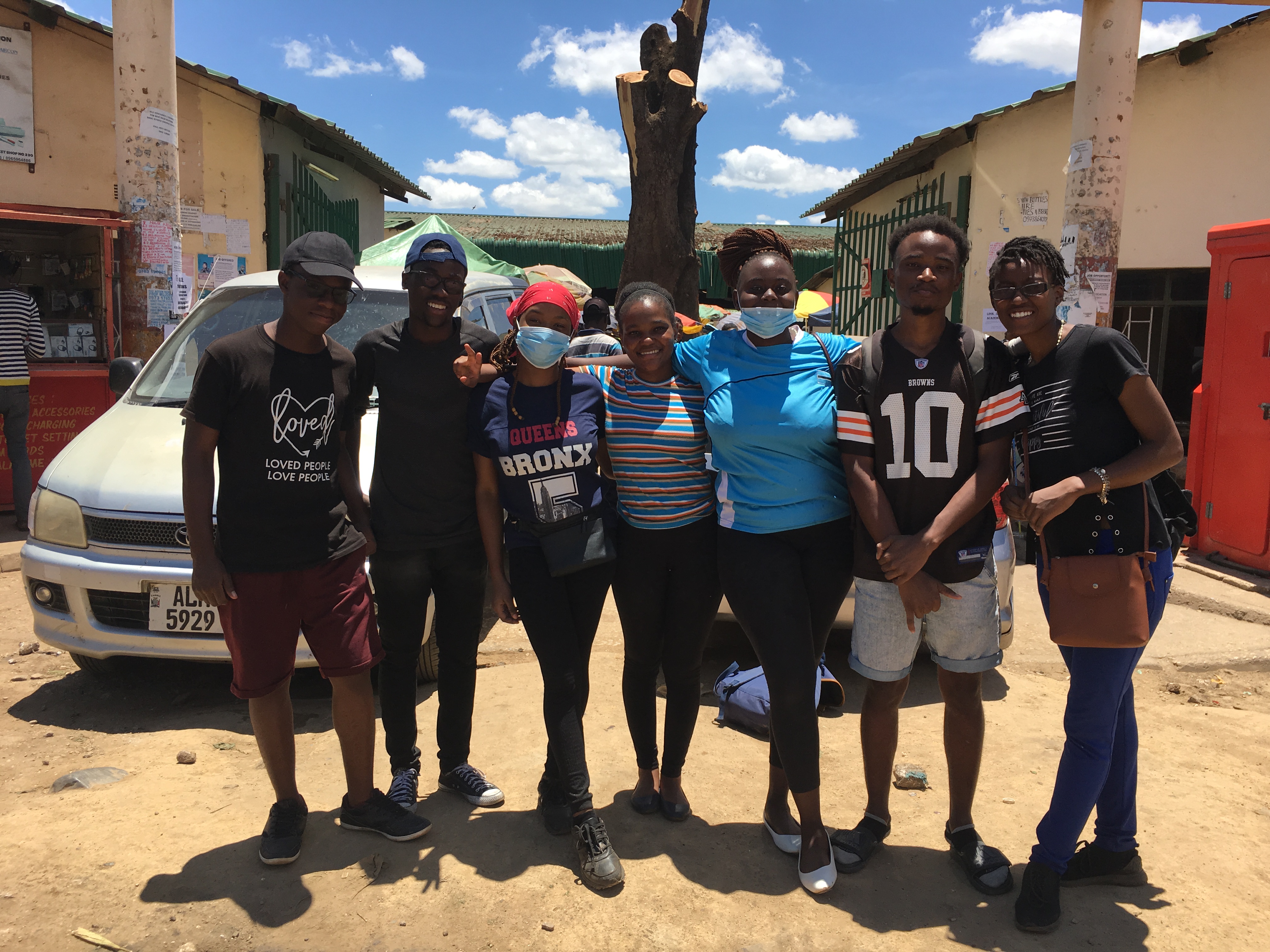 founders pose with volunteers